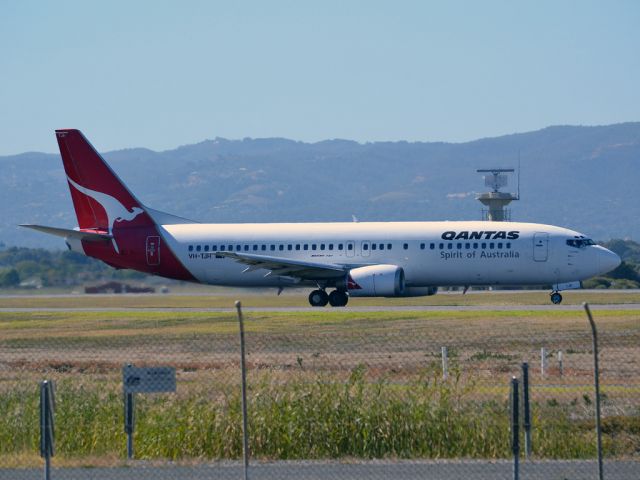 BOEING 737-400 (VH-TJR) - A Qantas old girl on taxi-way heading for take off on runway 05. Thursday 12th April 2012.