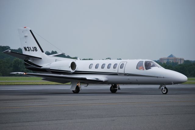 Cessna Citation II (N31JB) - NASCAR driver Jeff Burton arriving at KJQF - 6/17/09