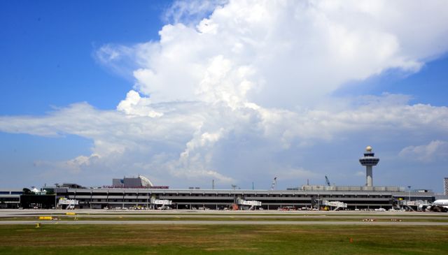 BOEING 767-300 (WSSS) - Landing at Singapore amidst clouds. Not very busy at that time of day...