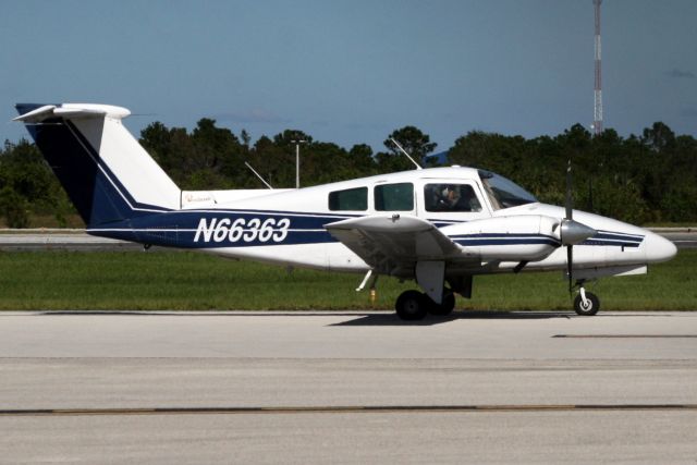 Beechcraft Duchess (N66363) - Taxiing to depart rwy 32 on 30-Oct-17.