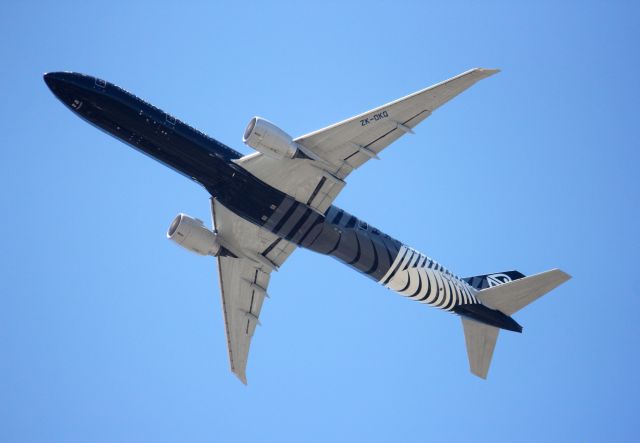 BOEING 777-300 (ZK-OQK) - All blacks livery blasting out of Sydney