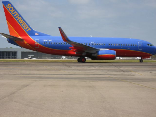 Boeing 737-700 (N247WN) - TAXIING TO GATE AFTER LANDING