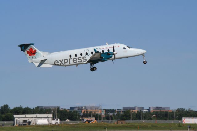 Beechcraft 1900 (C-GORZ) - Leaving Montreal-Trudeau on a clear Sunday morning