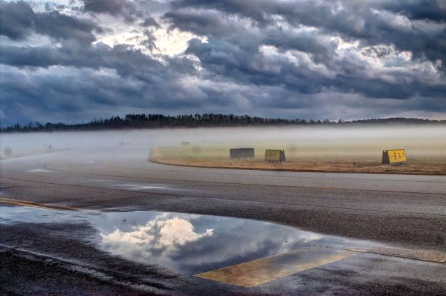 — — - The fog rolls in at LaGrange Callaway Airport.