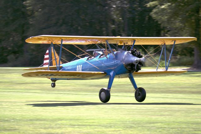 N43340 — - Flying as it was meant to be. Boeing PT-17 taking off from the grass runway at Triple Tree Aerodrome.