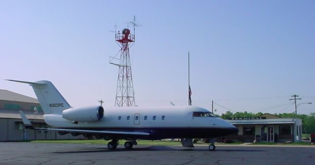 Canadair Challenger (N302PC) - Parked in front of Terminal...