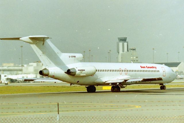 BOEING 727-200 (G-OPMN) - KSFO - Dec 2000 - Sun Country Airlines didnt have this jet very long when I took this from the old Millbrae Avenue Airpark. Shown here holding on Runway 1R ready to depart. Boeing 727 Super 27, CN 21578 LN: 1409.