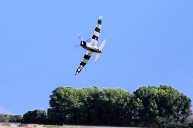 REPUBLIC Thunderbolt (NX4747D) - Taking a tight turn at Oshkosh.  P-47 "Bonnie" in the air at Oshkosh during AirVenture Saturday.  She is a flying tribute to the WW 2 men & women Republic Aircraft Workers of Evansville, IN. 