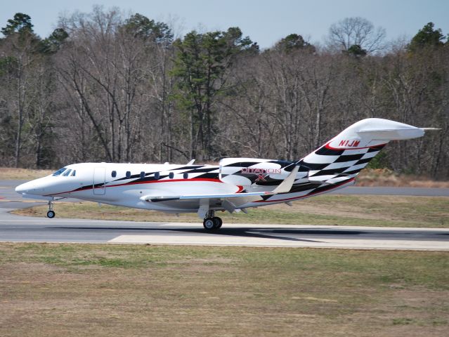 Cessna Citation X (N1JM) - CESSNA FINANCE CORPORATION (NASCAR driver Jamie McMurray) arriving runway 20 at KJQF - 3/14/14