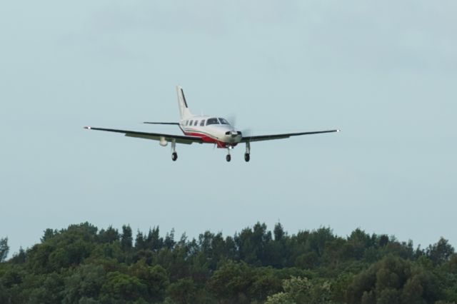 Piper Malibu Mirage (VH-KNV) - VH-KNV  Malibu Mirage on short final at Moorabbin, Melbourne after ferry flight from US.br /12/14/ 2011