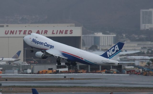 BOEING 747-8 (JA15KZ) - KSFO - Nippon Cargo 747-8F departing 28R on a rainy Saturday vapor shocking over the wings as this Boeing heavy screams for the sky...Nov 10th, 2017