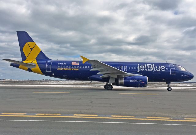 Airbus A320 (N775JB) - Vets in Blue !