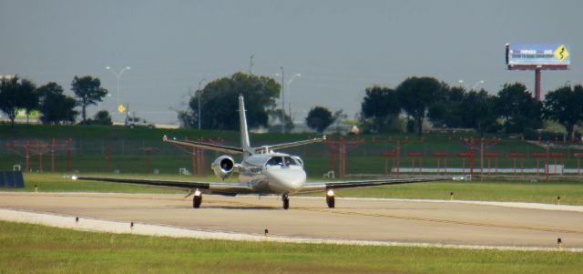 EIA5741 — - UC-35 taxiing into the TxDOT hangers at Austin-Bergstrom.