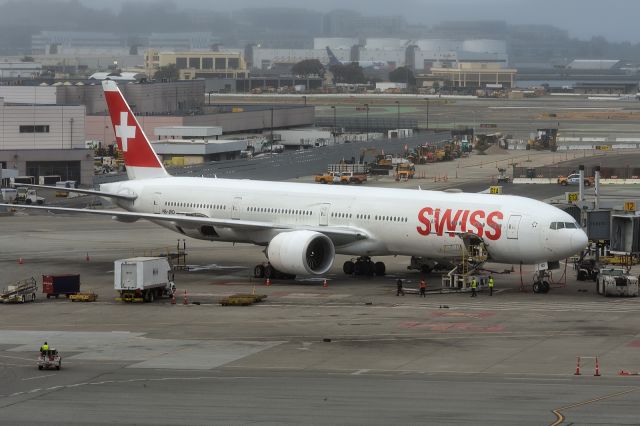 BOEING 777-300ER (HB-JND) - 17th August, 2024: Parked at Gate G13 at SFO's international terminal, aircraft is preparing to leave for Zurich as flight LX 039. 
