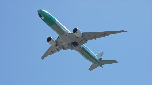 BOEING 777-300 (A6-EGZ) - BOE204 climbs from runway 34L for its maiden flight on 8/31/12.  (LN:104x  c/n 41081).