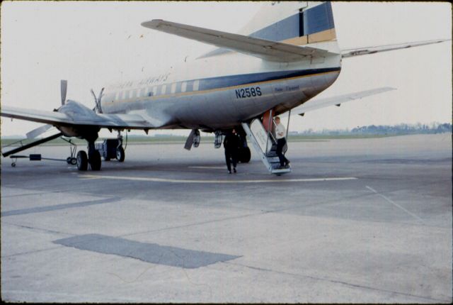 MARTIN 404 (N258S) - I am boarding aircraft for flight from Knoxville, Tennessee (KTYS)  to Nashville, Tennessee (BNA).  Fall, 1967