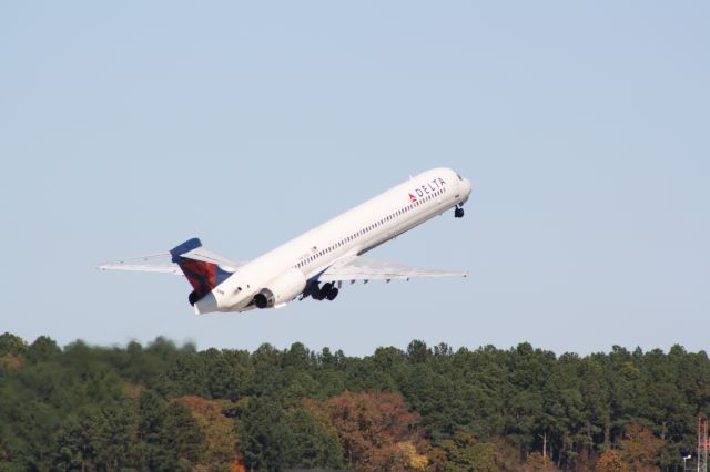 McDonnell Douglas MD-90 (N921DN) - N921DN gear in transit after taking off runway 5L