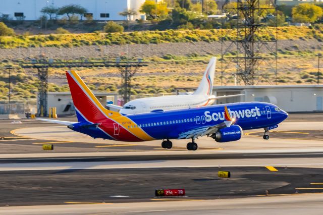 Boeing 737 MAX 8 (N8773Q) - A Southwest Airlines 737 MAX 8 landing at PHX on 2/19/23. Taken with a Canon T7 and Tamron 70-200 G2 lens.