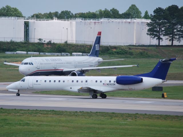 Cessna Citation Excel/XLS (KCLT) - Back taxiing into position runway 18C - 5/21/13