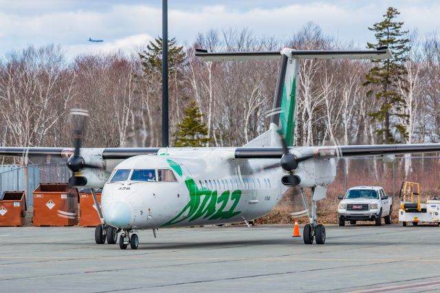 de Havilland Dash 8-300 (C-FSOU) - Green jazz departing YHZ for YYT