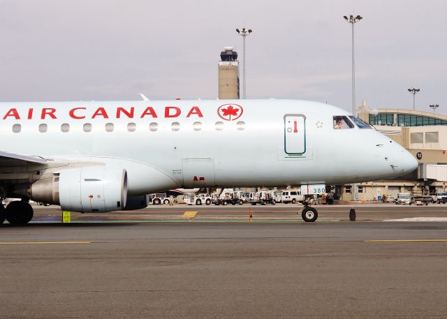 Embraer 175 (C-FEKD) - C-FEKD as fleet #380 an E175 taxiing outbound with ATIS Romeo on K for a RWY 9 departure !