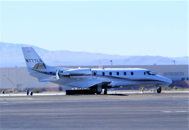 Cessna Citation Excel/XLS (N777LX) - Hmmm... Thrust reverser on the taxiway.