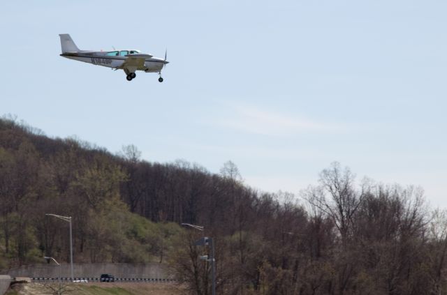 Beechcraft Bonanza (33) (N1849P) - Perfect approach to runway 26.  Aircraft took fuel at RELIANT AIR. The lowest fuel price on the Danbury (KDXR) airport.