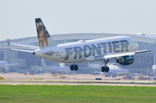 Airbus A319 (N214FR) - Frontier N214FR A319 arriving KDFW 07/31/2013 - Its a VERY HOT day 100° so hazy pictures...Sorry.