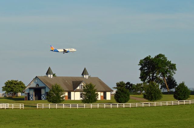 N219NV — - Allegiant (AAY) flight 1702 from Ft. Lauderdale, FL. KFLL USA flies near a beautiful horse barn near Bluegrass Airport, Lexington, Ky. KLEX USA.