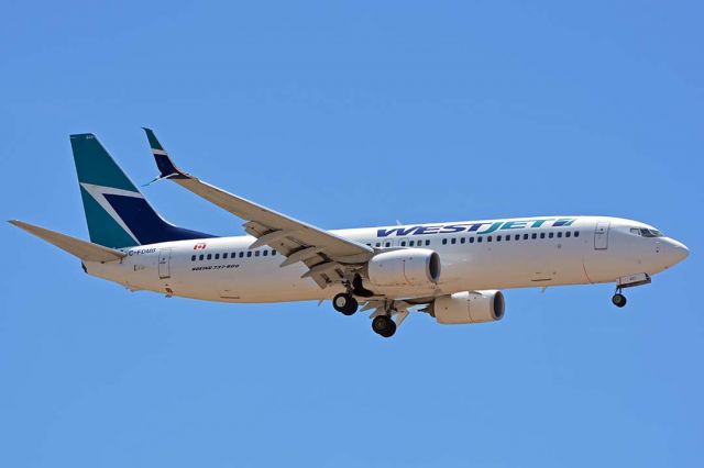 Boeing 737-800 (C-FDMB) - WestJet Boeing 737-8CT C-FDMB at Phoenix Sky Harbor on July 19, 2018.