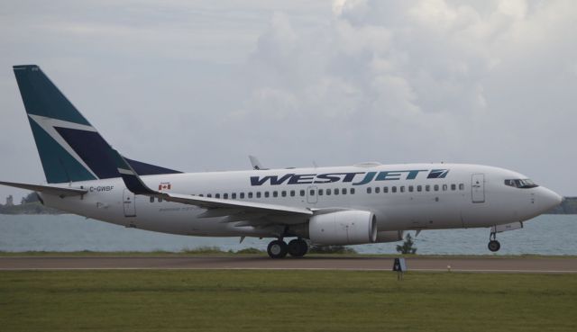 Boeing 737-700 (C-GWBF) - WJA 2711 departing on Rwy 30 for CYYZ.