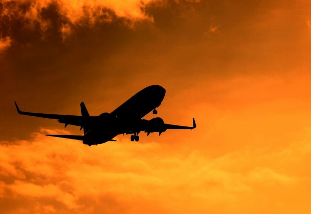 Boeing 737-700 — - Aircraft approaching for landing over KCH/WBGG  before a beautiful sunset golden hour.