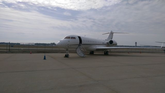 Bombardier Global Express (N10HD) - Beautiful new Global 6000 on the FBO tarmac  @ KSTL one windy Feb 2016 afternoon. 