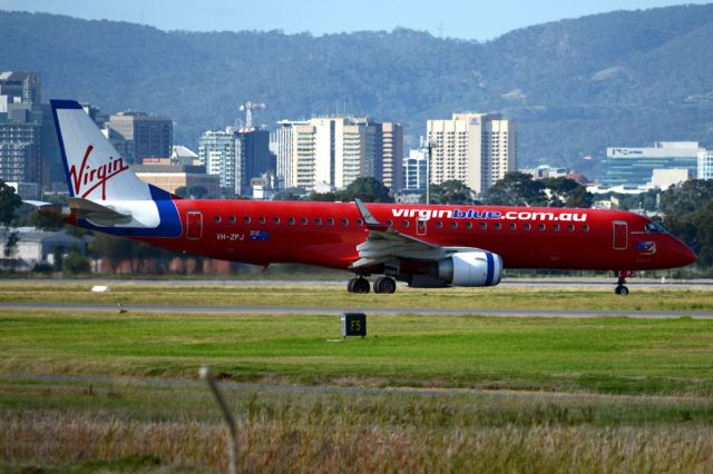 Embraer ERJ-190 (VH-ZPJ) - On taxiway heading for take-off on runway 05. Wednesday, 21st May 2014.