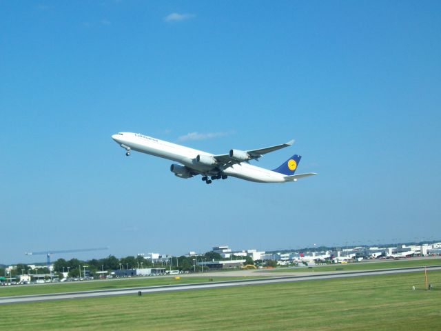 — — - Lufthansa A340 taking off from Charlotte headed to Munich.