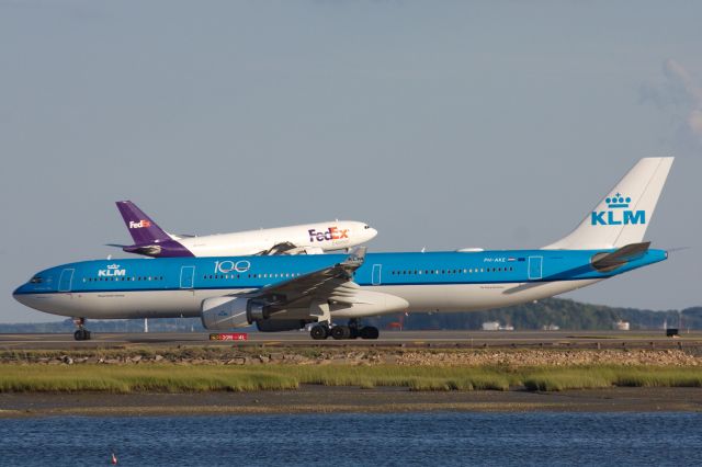 Airbus A330-300 (PH-AKE) - Airbus all the time :) KLM A330-300 taxi's for departure while Fed Ex A300 about to touchdown in back on 8/18/20.