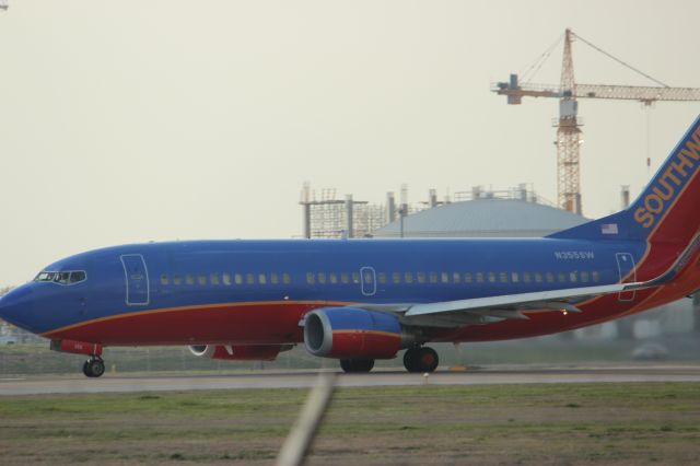 BOEING 737-300 (N355SW) - A Wednesday dusk departure as viewed from the Family Viewing Area.
