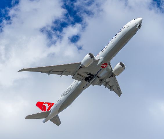 BOEING 777-300 (TC-LJI) - GO AROUND! A United A319 was parked at the threshold of runway 23 waiting for a Cubana Tupolev to vacate the runway. This Turkish 777 actually got quite close before he pulled the nose up and powered away at quite a steep angle!