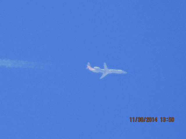 Embraer ERJ-145 (N928AE) - American Eagle flight 3242 from OKC to ORD over Southeastern Kansas at 35,000 feet.