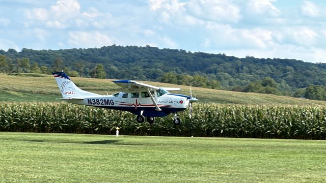 Cessna 206 Stationair (N382MG) - Departing RWY 25 at Keller Bros