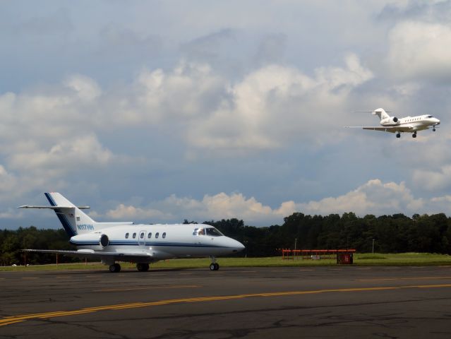 Hawker 800 (N117HH) - Holding short runway 16 for landing traffic.