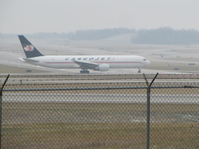 BOEING 767-300 (C-GCIJ) - Cargojet Boeing 767-306(ER)(BDSF) taxiing to depart on runway 18L at CVG airport on a foggy day. Photo taken on 12/17/2020