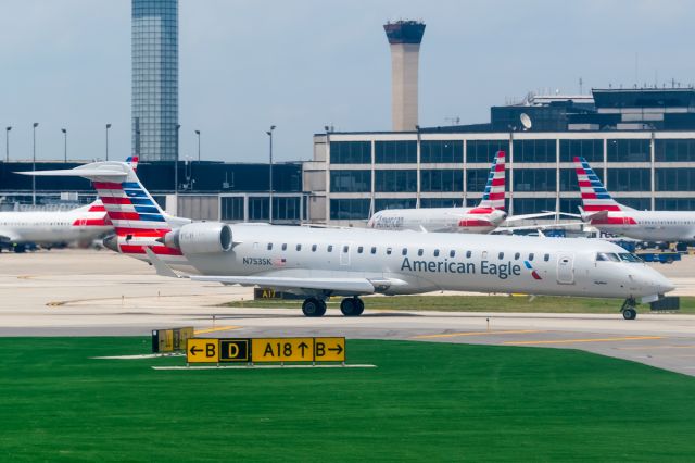 Canadair Regional Jet CRJ-700 (N753SK) - Ohare offers a wide variety of aircraft. Sometimes these shots are one in one hundred