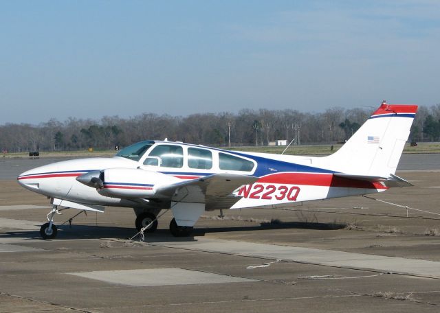 Beechcraft Baron (58) (N223Q) - Parked at the Monroe,LA airport.