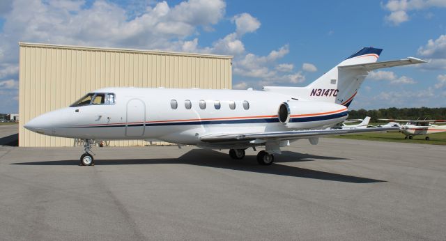 Hawker 800 (N314TC) - A 1999 model (serial number 258400) Raytheon Hawker 800XP at Boswell Field, Talladega Municipal Airport, AL, during the 2023 NASCAR YellaWood 500 @ Talladega Superspeedway - October 1, 2023.