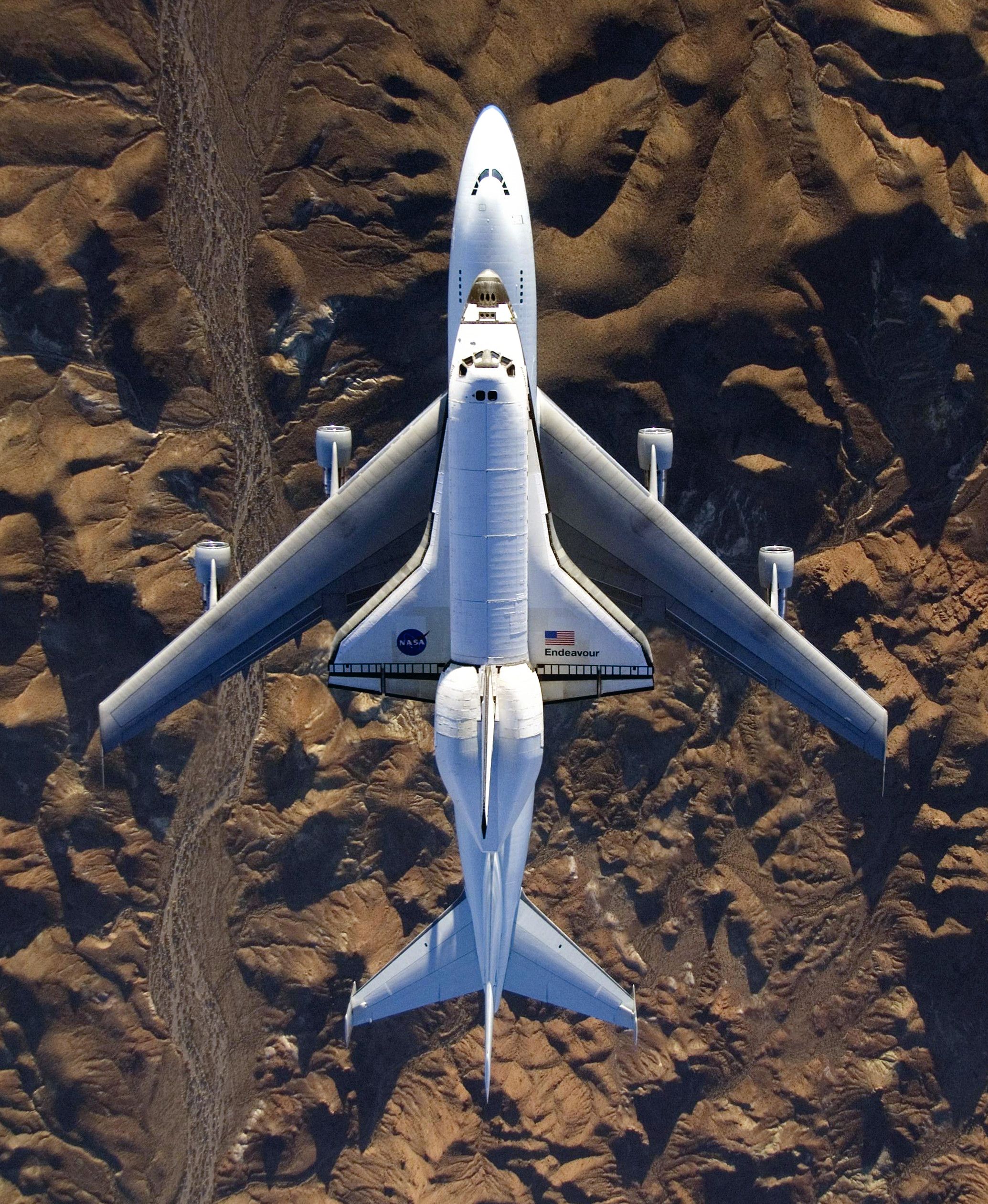 Boeing 747-200 (N911NA) - STS-126 The Space Shuttle Endeavour mounted atop its modified Boeing 747 carrier aircraft flies over Californias Mojave Desert on its way back to the Kennedy Space Center in Florida on Dec 10, 2008.  Public domain NASA photo by Carla Thomas Photo ID: ED08-0306-131