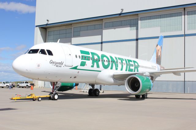 Airbus A320 (N227FR) - N227FR in Denver within minutes of it being unveiled to the media in Frontiers new livery.
