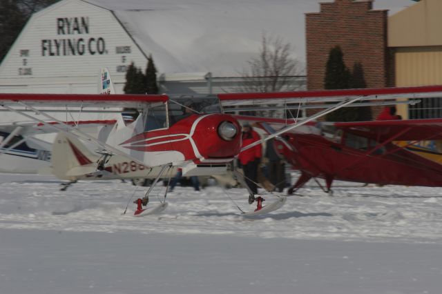 — — - Take-Off at Ski Plane Fly-In Pioneer Airport Oshkosh, 1-21-12