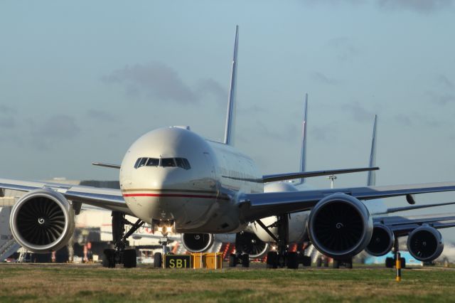 Boeing 777-200 — - Eithad B777-300ER, Delta B767-400 and a United B777-200ER lined up on taxiway Sierra Bravo One.