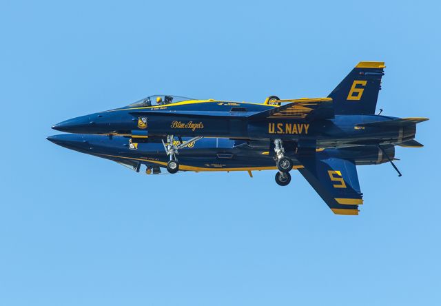 McDonnell Douglas FA-18 Hornet — - Blue Angels 5 & 6 with gear down performing a side by side pass. Notice that pilot #5 is looking ahead and #6 is only watching aircraft separation. What great performers! Questions about this photo can be sent to Info@FlewShots.com